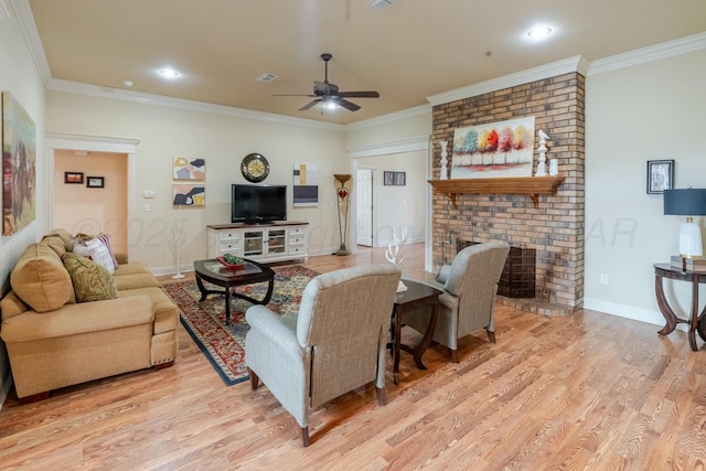 8301 El Paso Dr, Amarillo, TX 79118 - living area featuring a ceiling fan, light wood-type flooring, ornamental molding, a brick fireplace, and recessed lighting