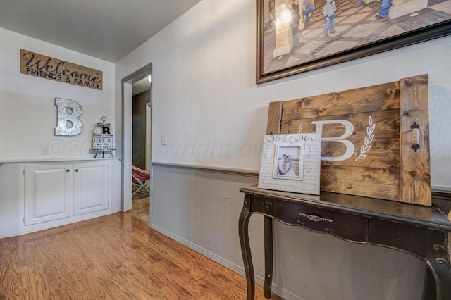 3409 Harmony St, Amarillo, TX 79109 - corridor with light wood-style floors and baseboards