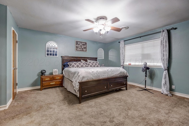 3409 Harmony St, Amarillo, TX 79109 - carpeted bedroom featuring baseboards and ceiling fan