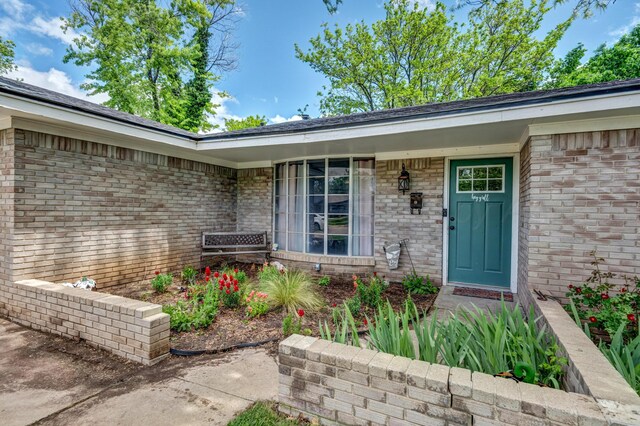 3409 Harmony St, Amarillo, TX 79109 - view of exterior entry featuring brick siding