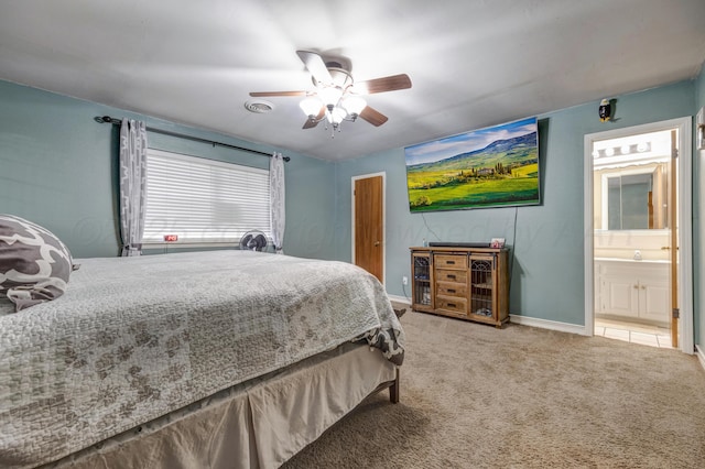 3409 Harmony St, Amarillo, TX 79109 - carpeted bedroom featuring connected bathroom and ceiling fan