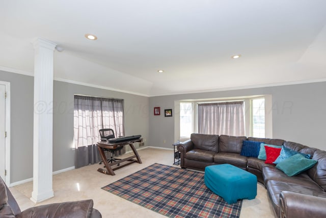 living room featuring ornate columns, light carpet, ornamental molding, baseboards, and lofted ceiling