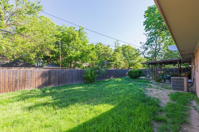 view of yard featuring central AC