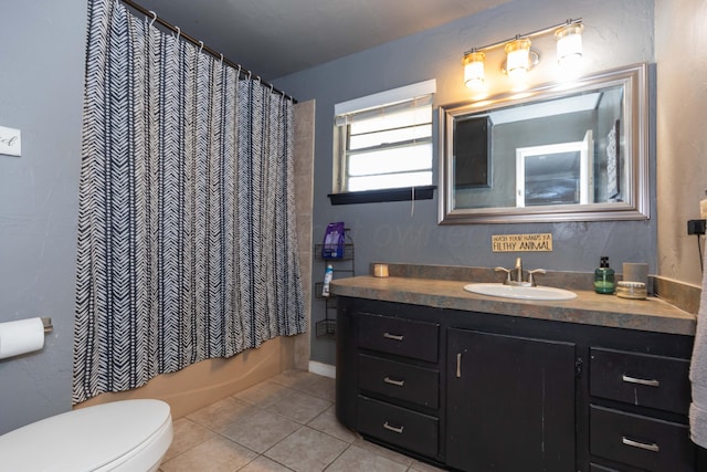 bathroom with tile patterned flooring, vanity, toilet, and shower / bath combination with curtain