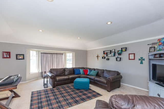 living room featuring light colored carpet, baseboards, and recessed lighting