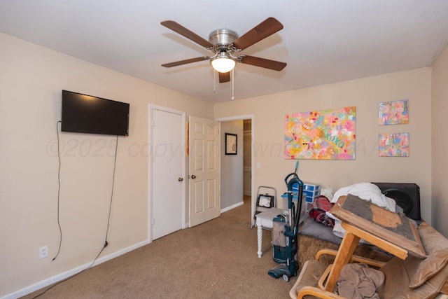 bedroom featuring carpet, a ceiling fan, and baseboards
