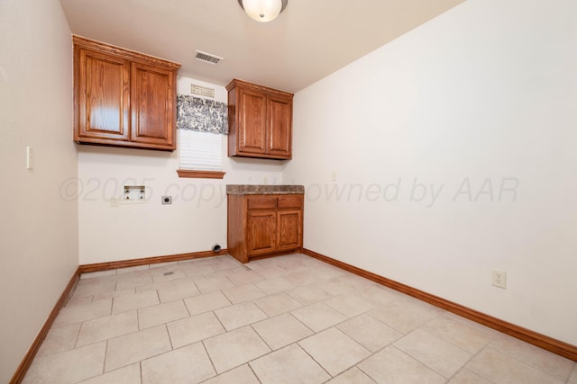 8102 Little Rock Dr, Amarillo, TX 79118 - laundry area with cabinet space, hookup for an electric dryer, hookup for a washing machine, and hookup for a gas dryer