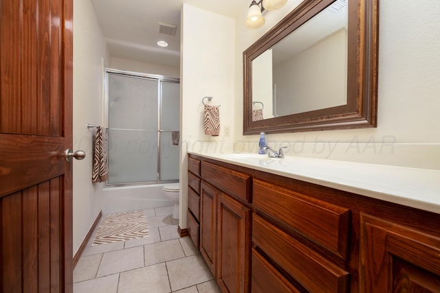 8102 Little Rock Dr, Amarillo, TX 79118 - bathroom featuring vanity, tile patterned flooring, bath / shower combo with glass door, and recessed lighting