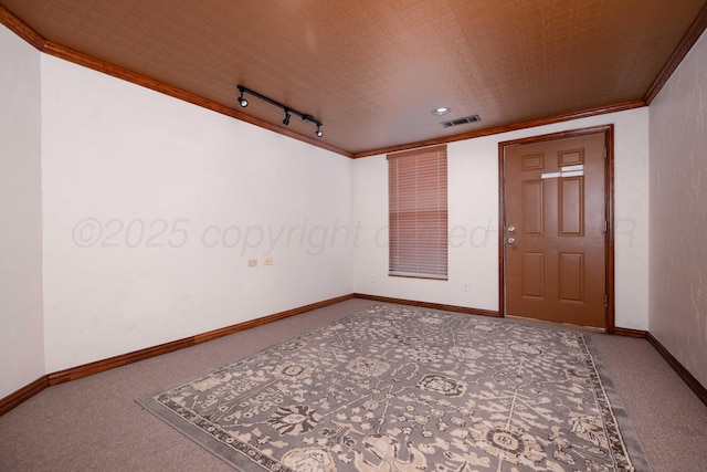 8102 Little Rock Dr, Amarillo, TX 79118 - carpeted empty room with track lighting and crown molding