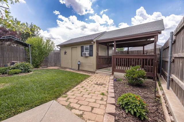 8102 Little Rock Dr, Amarillo, TX 79118 - fenced backyard featuring cooling unit, a wooden deck, and a patio
