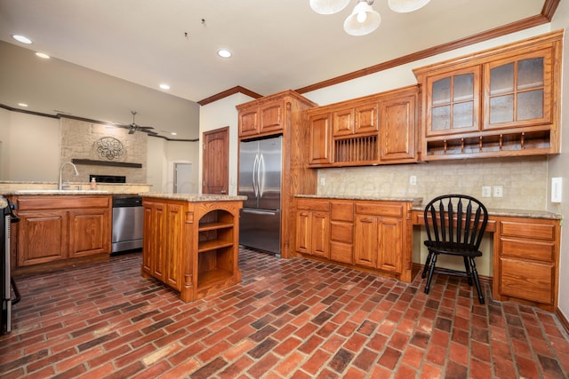8102 Little Rock Dr, Amarillo, TX 79118 - kitchen with open shelves, appliances with stainless steel finishes, a ceiling fan, brick flooring, and crown molding