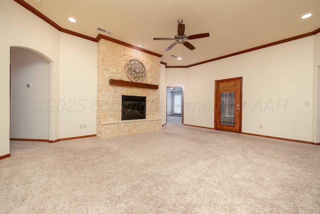8102 Little Rock Dr, Amarillo, TX 79118 - unfurnished living room featuring arched walkways, carpet floors, ceiling fan, ornamental molding, and recessed lighting