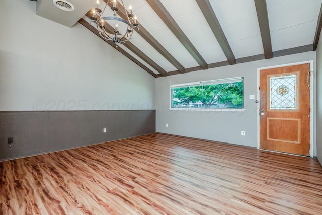 3110 S Apache St, Amarillo, TX 79103 - unfurnished living room featuring a chandelier and wood finished floors