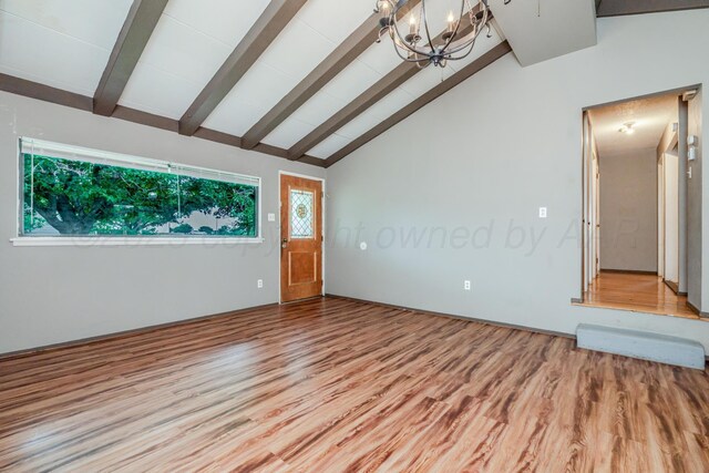3110 S Apache St, Amarillo, TX 79103 - empty room with light wood-style floors and a chandelier