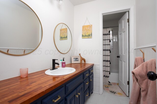 3509 Huntington Dr, Amarillo, TX 79109 - bathroom with vanity, tile patterned floors, and shower / bath combo