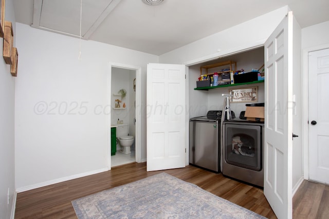 3509 Huntington Dr, Amarillo, TX 79109 - laundry room with independent washer and dryer, attic access, and wood finished floors