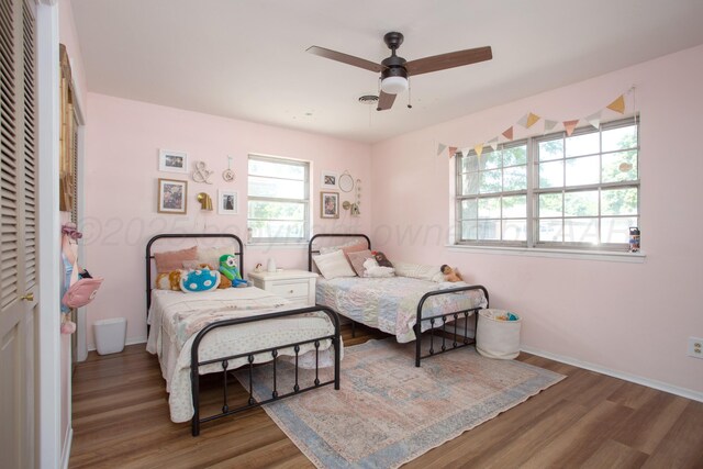 3509 Huntington Dr, Amarillo, TX 79109 - bedroom with wood finished floors and ceiling fan