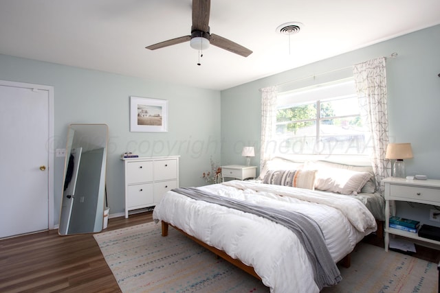 3509 Huntington Dr, Amarillo, TX 79109 - bedroom featuring wood finished floors and ceiling fan
