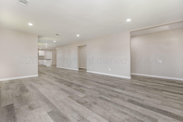 918 N Gray St, Amarillo, TX 79065 - unfurnished room featuring recessed lighting and light wood-type flooring