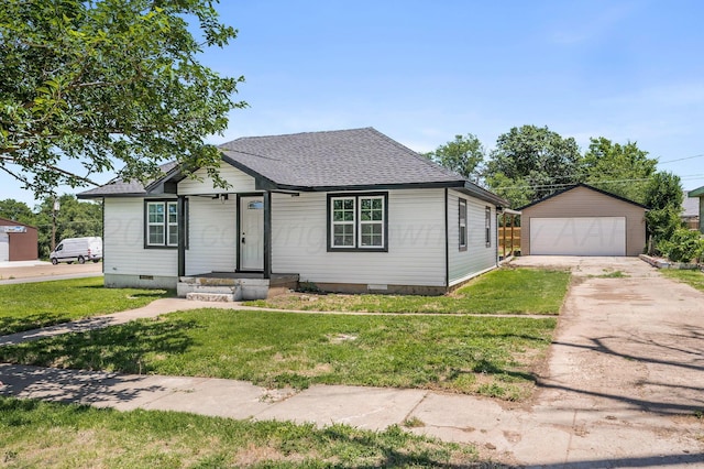 918 N Gray St, Amarillo, TX 79065 - view of front of house featuring crawl space, a garage, an outdoor structure, roof with shingles, and a front yard