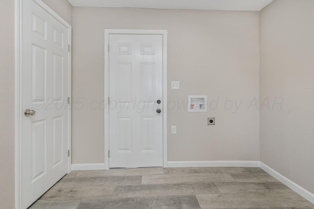 918 N Gray St, Amarillo, TX 79065 - laundry room with electric dryer hookup, washer hookup, and light wood-type flooring
