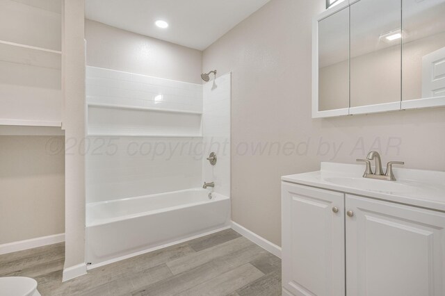 918 N Gray St, Amarillo, TX 79065 - bathroom featuring wood finished floors, shower / tub combination, and vanity
