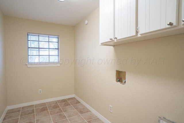 5003 Greenway Pl, Amarillo, TX 79109 - laundry area featuring cabinet space and washer hookup