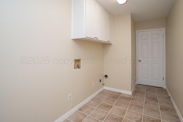 5003 Greenway Pl, Amarillo, TX 79109 - laundry room featuring cabinet space, hookup for a washing machine, light tile patterned floors, and gas dryer hookup