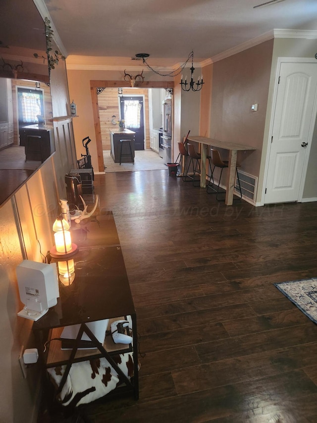 3114 Palm St, Amarillo, TX 79107 - living room with crown molding and wood finished floors