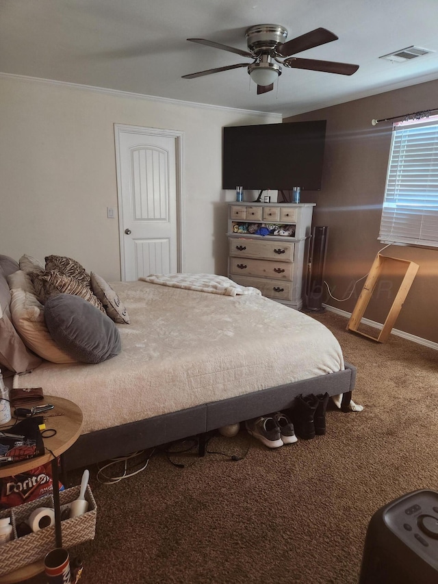 3114 Palm St, Amarillo, TX 79107 - bedroom with carpet flooring, crown molding, and ceiling fan