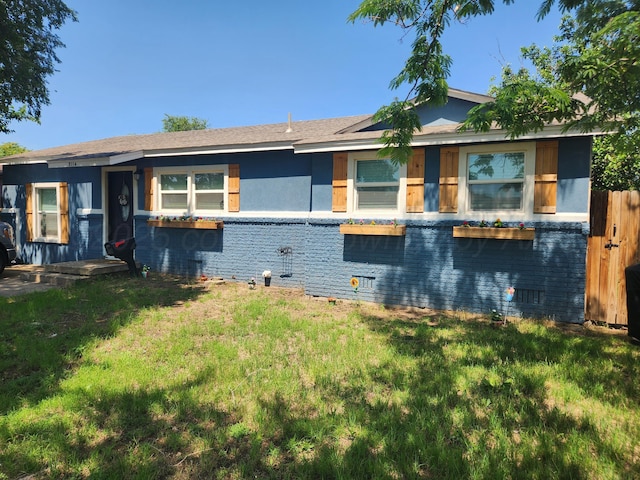3114 Palm St, Amarillo, TX 79107 - rear view of house featuring a lawn and brick siding