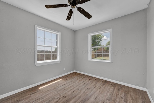 4360 S Polk St, Amarillo, TX 79110 - unfurnished room featuring wood finished floors and a ceiling fan