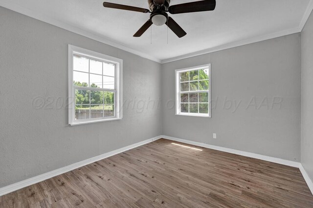 4360 S Polk St, Amarillo, TX 79110 - empty room with crown molding, wood finished floors, and a ceiling fan