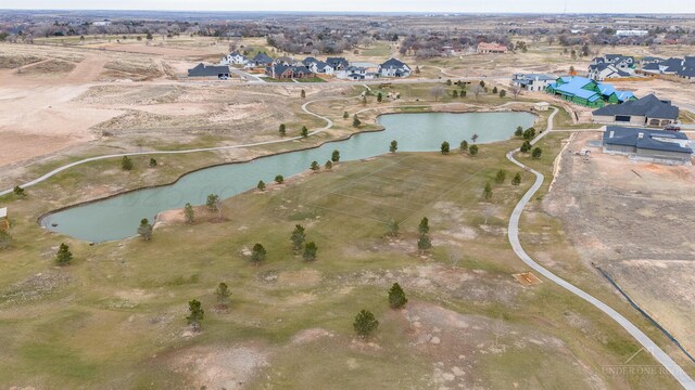 1207 Herring Ranch Rd, Amarillo, TX 79124 - aerial view of property and surrounding area with a large body of water and nearby suburban area