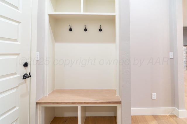 1207 Herring Ranch Rd, Amarillo, TX 79124 - mudroom with baseboards and wood finished floors