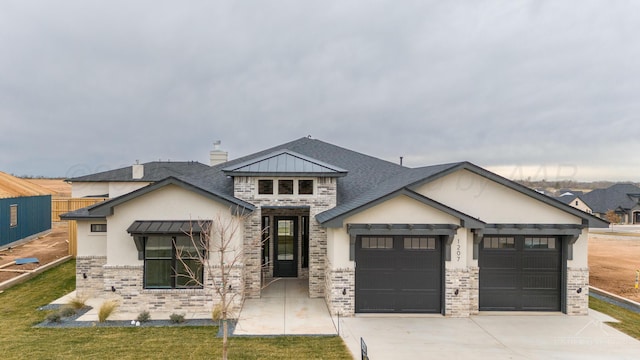 1207 Herring Ranch Rd, Amarillo, TX 79124 - view of front of property with a garage, stucco siding, concrete driveway, stone siding, and brick siding