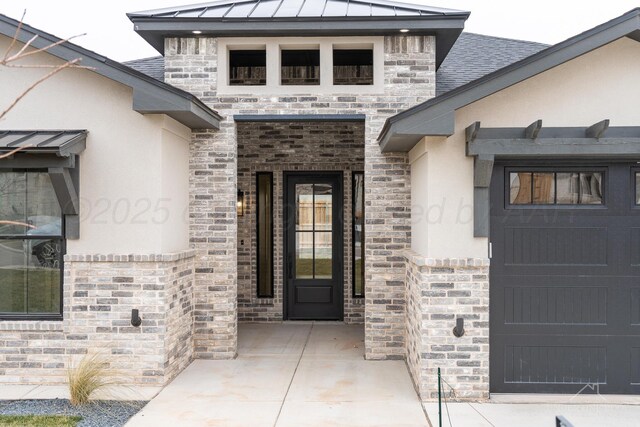 1207 Herring Ranch Rd, Amarillo, TX 79124 - property entrance featuring stucco siding, a standing seam roof, and a metal roof