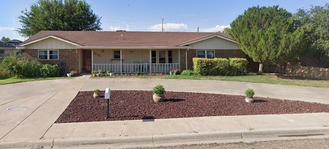 ranch-style home with covered porch