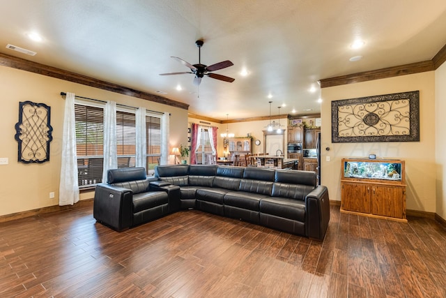 12 William Ln, Canyon, TX 79015 - living room featuring a ceiling fan, crown molding, dark wood-style flooring, and plenty of natural light
