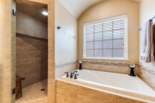 12 William Ln, Canyon, TX 79015 - full bathroom featuring a garden tub, a tile shower, and lofted ceiling