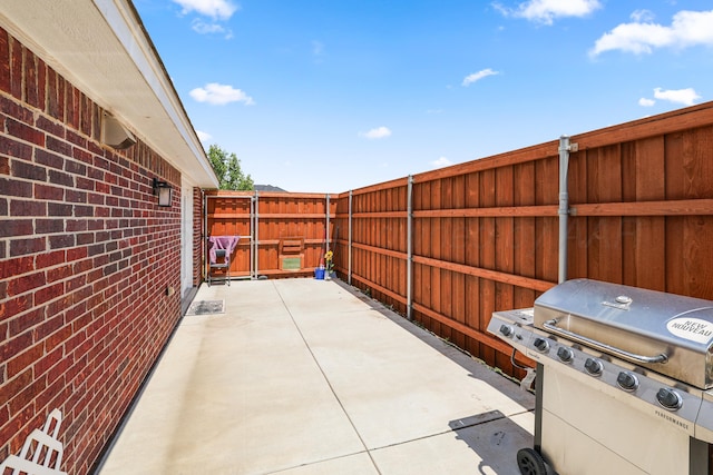 3001 Bismarck Ave, Amarillo, TX 79118 - view of patio / terrace featuring a grill and a fenced backyard