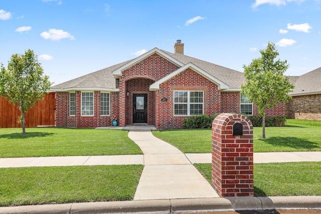 3001 Bismarck Ave, Amarillo, TX 79118 - view of front of house with brick siding, a chimney, and roof with shingles