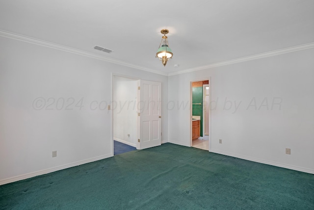 2614 Parker St, Amarillo, TX 79109 - unfurnished room featuring crown molding, baseboards, and carpet flooring