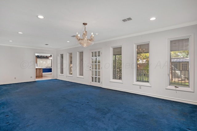 2614 Parker St, Amarillo, TX 79109 - unfurnished living room featuring dark colored carpet, a chandelier, ornamental molding, recessed lighting, and baseboards