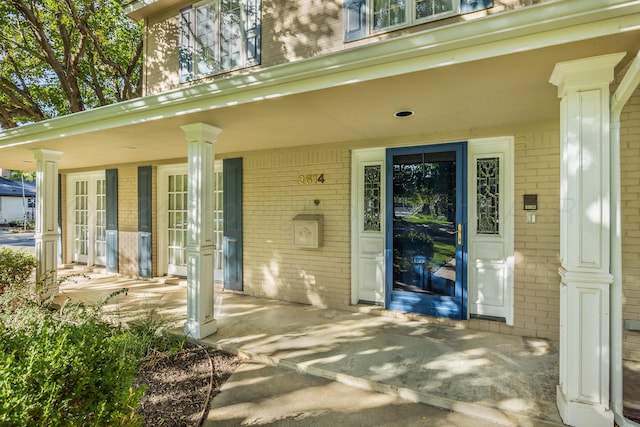 2614 Parker St, Amarillo, TX 79109 - entrance to property with brick siding and a porch