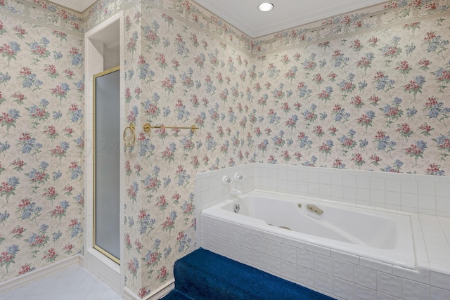 2614 Parker St, Amarillo, TX 79109 - bathroom featuring baseboards, a garden tub, a shower stall, crown molding, and tile patterned floors