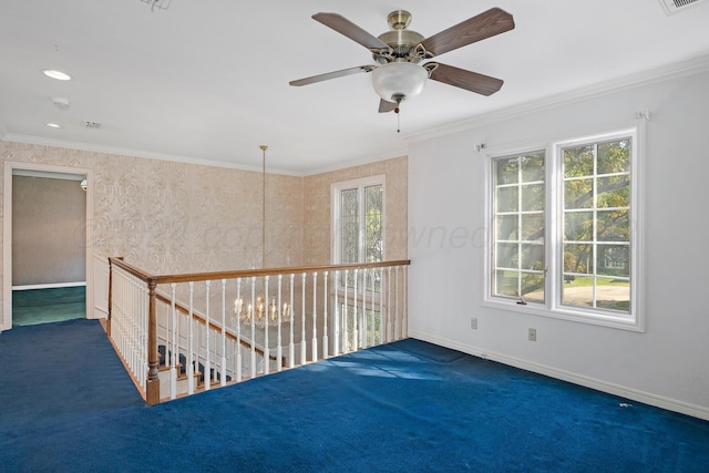 2614 Parker St, Amarillo, TX 79109 - unfurnished room with carpet, baseboards, ceiling fan, crown molding, and a smoke detector