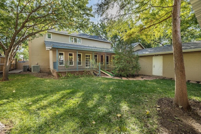 2614 Parker St, Amarillo, TX 79109 - back of property featuring central AC unit, covered porch, and a shingled roof