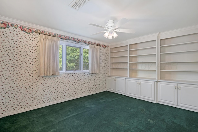 2614 Parker St, Amarillo, TX 79109 - unfurnished room featuring wallpapered walls, dark colored carpet, ceiling fan, baseboards, and ornamental molding