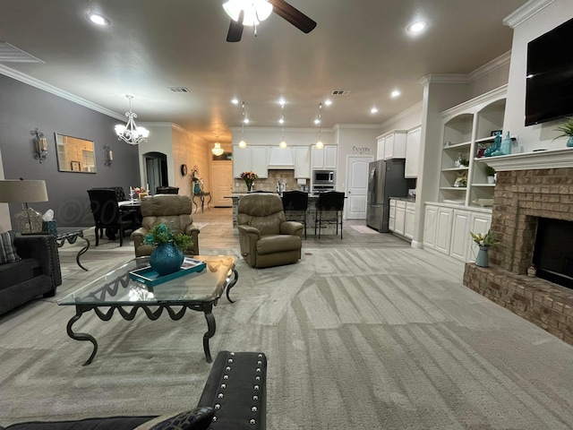 living room featuring ornamental molding, a ceiling fan, light carpet, and a fireplace
